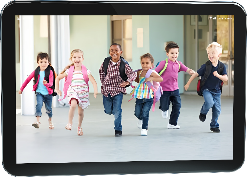 Elementary students running after school shown on a tablet screen illustrating how the Kidz and Keyz digital dismissal process works for Charleston schools